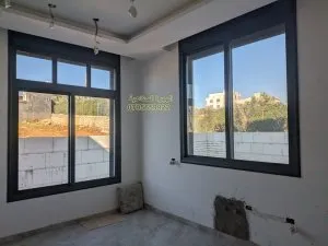 أعمال الهجرة الصناعية — شبابيك وأبواب عمّان
