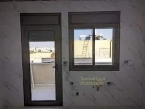 أعمال الهجرة الصناعية — شبابيك وأبواب عمّان