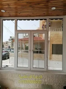 أعمال الهجرة الصناعية — شبابيك وأبواب عمّان